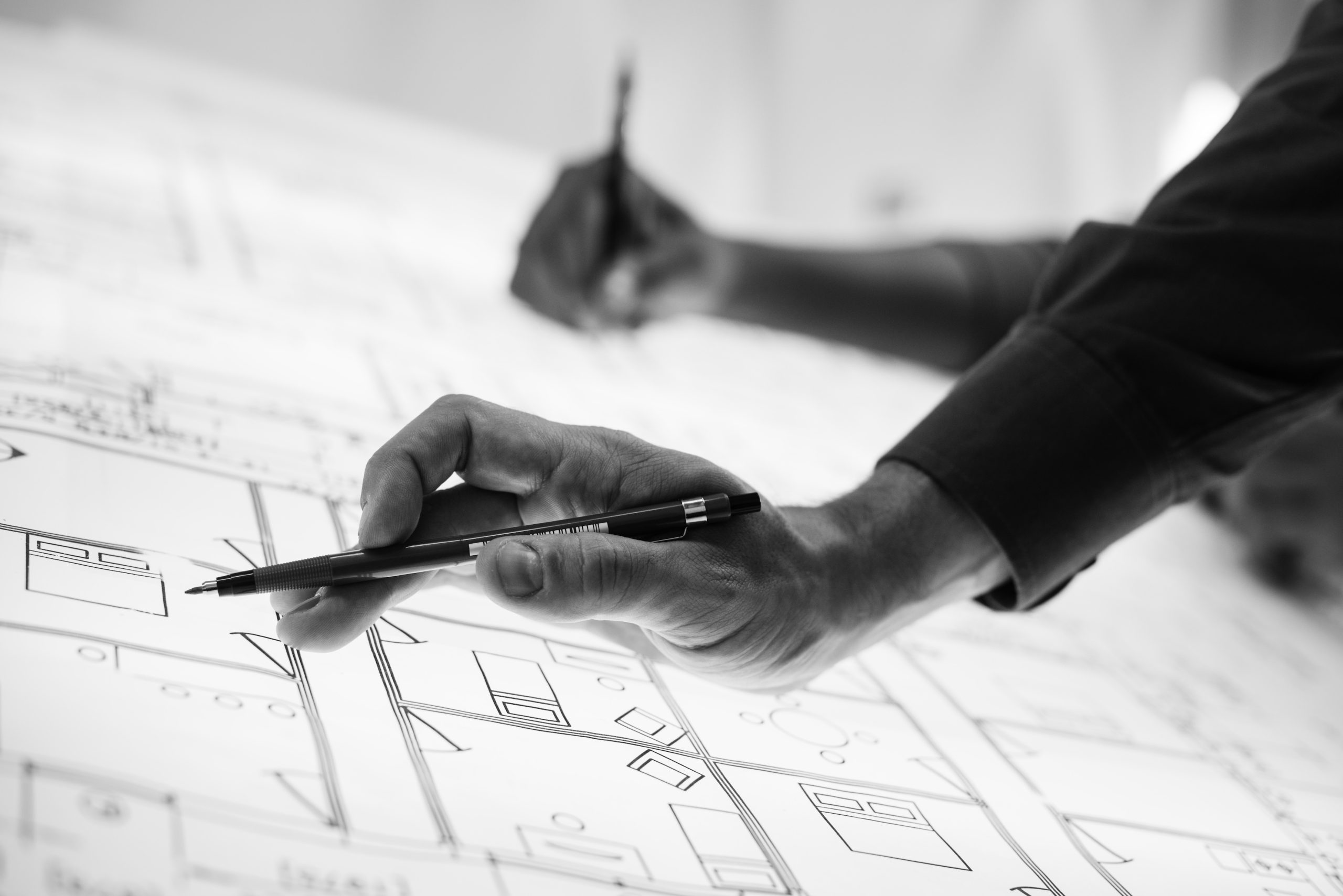 Close up of hands working on paperwork